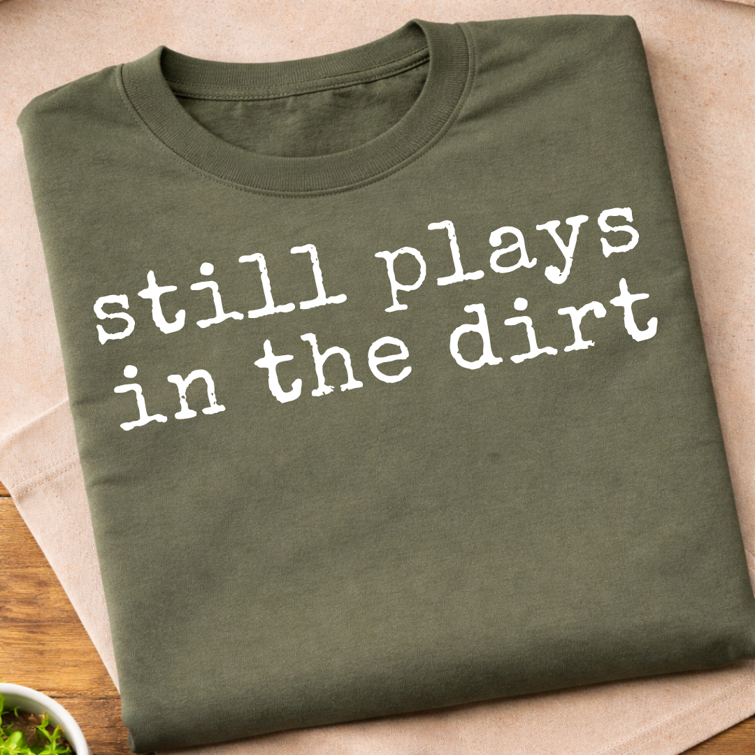 Still Plays In The Dirt T-Shirt